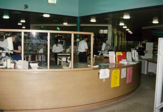 Image of Northcote library with round customer service desk before refurbishment