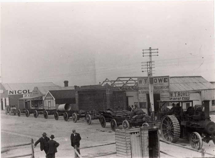 Image of Logging trucks at corner of High Street and Dundas Street Preston
