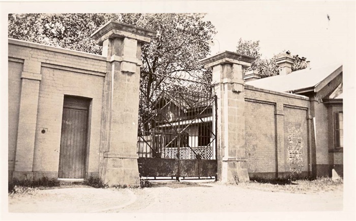Image of the Entry gates and guard house to asylum