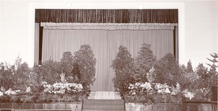 Image of The floral stage setting for the 1968 Northcote Mayoral Ball hosted by Cr. Hardiman
