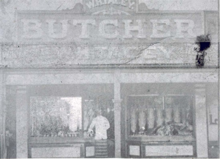 Image of W.A. Tacey, Butcher, outside his wholesale shop in High Street, Northcote