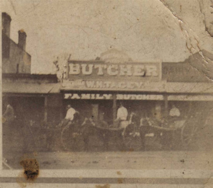 Image of W.A. Tacey's wagons outside his butcher store in High Street, Northcote