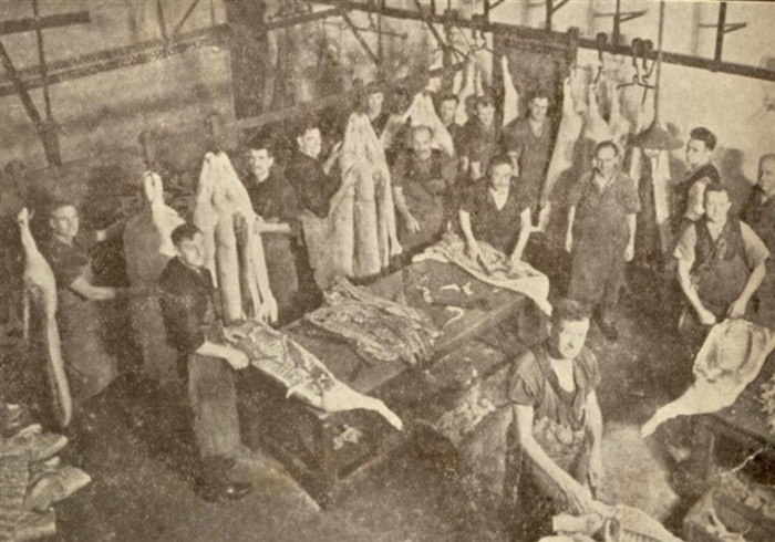 Image of Curing bacon in the factory.