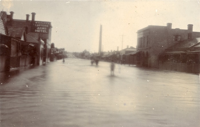 Image of High Street flooded in 1911. View is from just above Separation Street looking south. [LHRN2024]