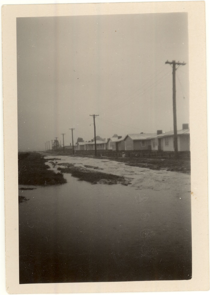 Image of Typical 1940s houses in Reservoir during a flood