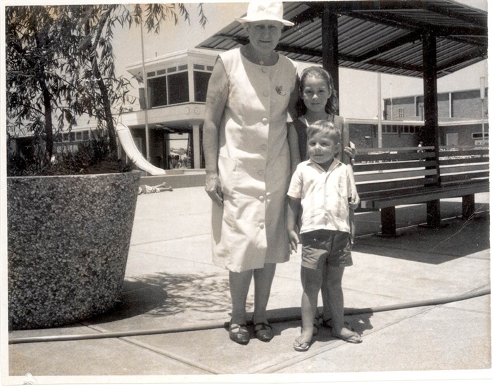 Photograph of Millie Hart, Swimming Teacher, with Debbie and Paul Cairns, children of Peter Cairns, Pool Manager (late 1960s)