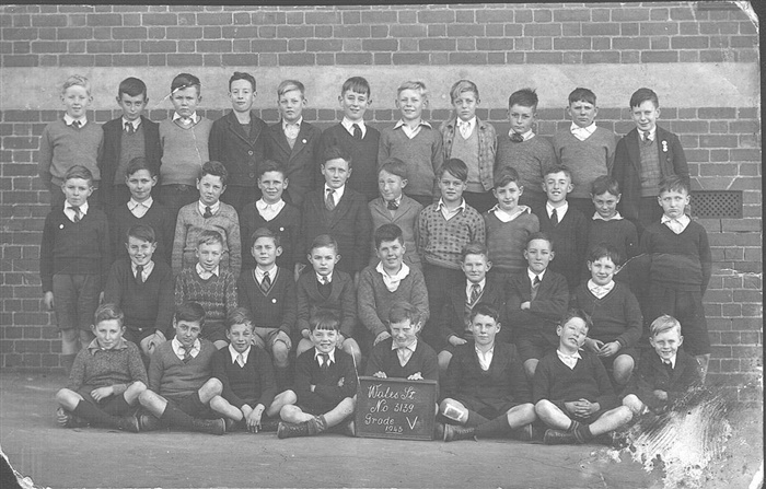 Image of the Pupils of Grade 5 (1943) Keith Stickland 2nd from right on front row. Donated by Margaret Stickland.