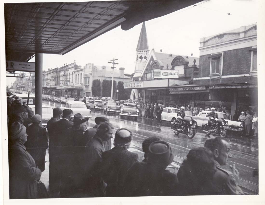 Image of Cortege leaving the Northcote Uniting Church in High Street after the funeral of Cr. Alan Bird, July 24, 1962