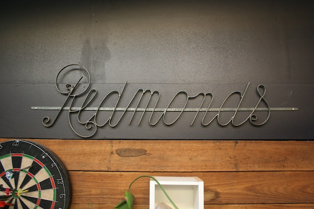 Image of the original sign to Redmond's Ironmongery 