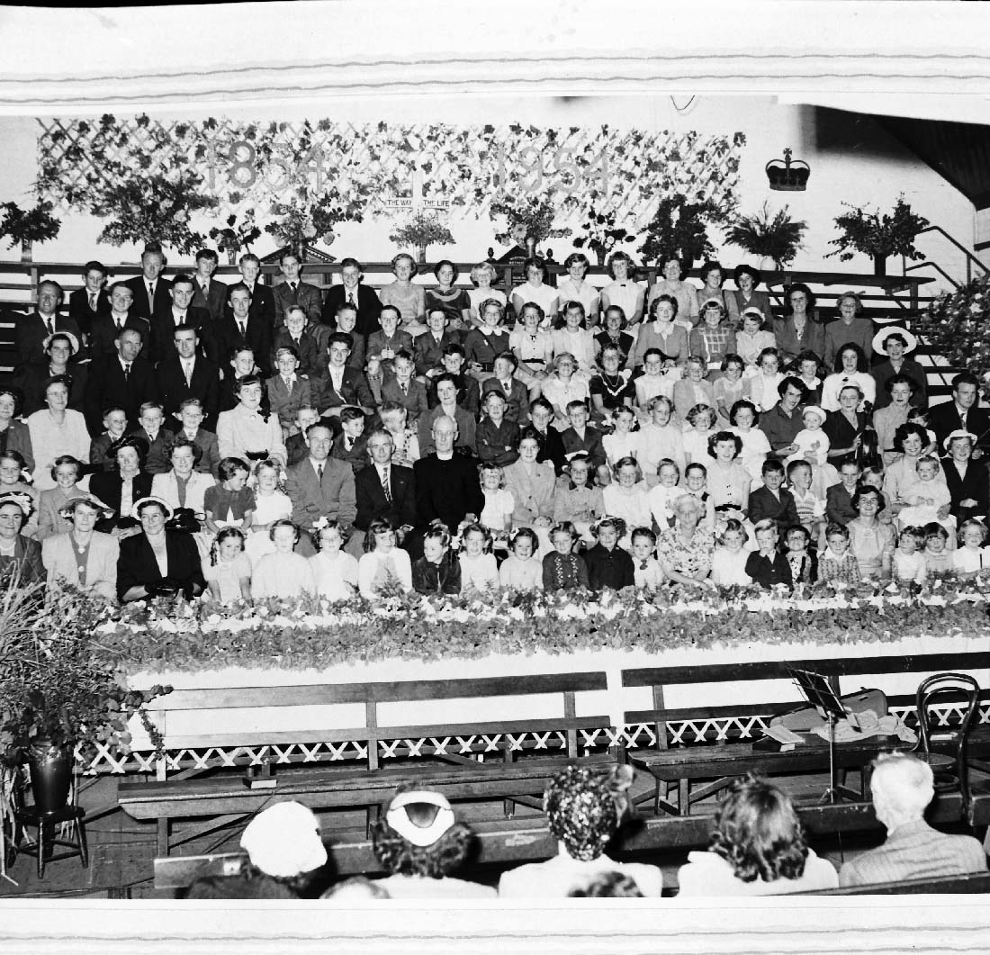 Image of Choir preparing for the Royal Visit 1954. Probably part of the Australian Paper Mills stand