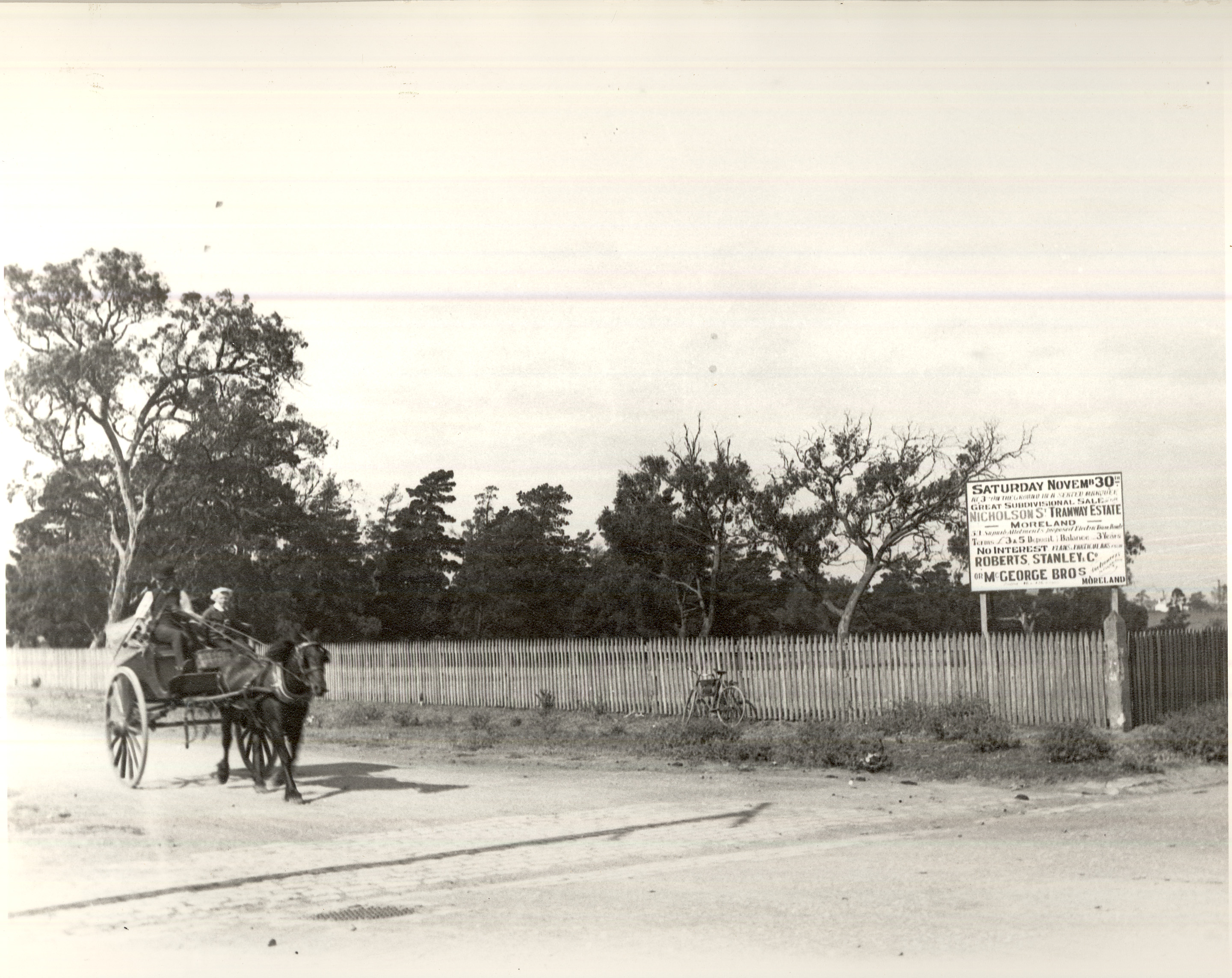 Image of Horse and buggy alongside sign for Tramway Estate sale