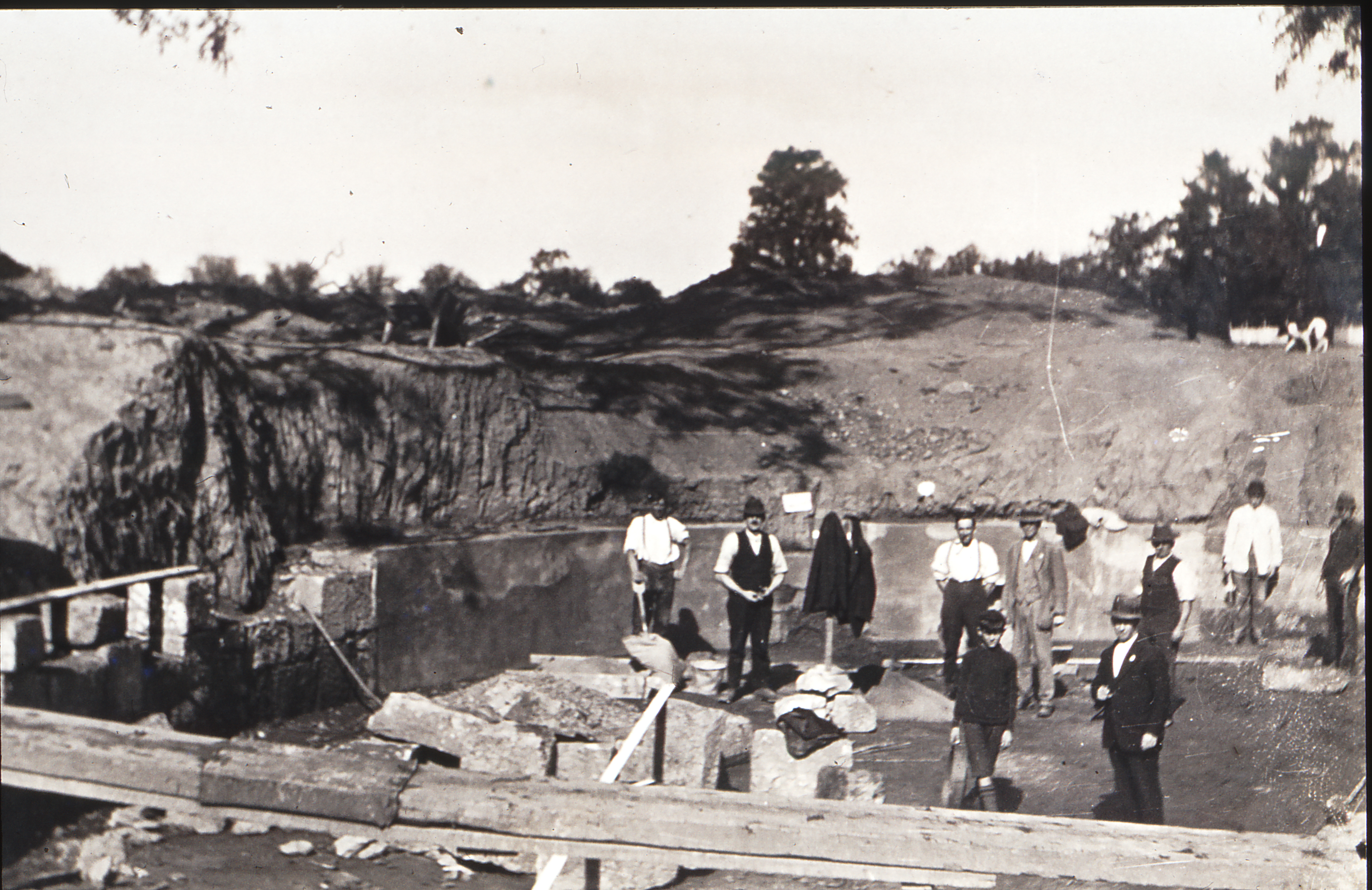 Image of Men beside the partially constructed Alphington Swimming Pool 1920-1921