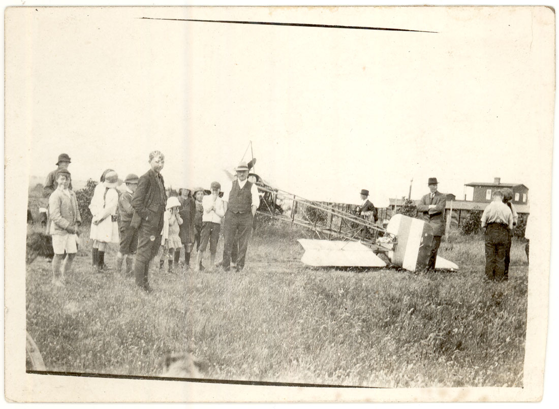 Image of Early aircraft landed in Reservoir c1910. 