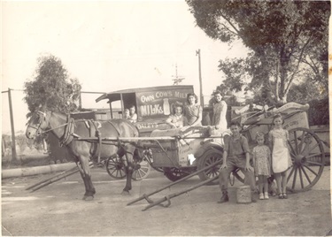Images of Daley's Dairy children. In the wagon are Joe and Jim. In the float are Grace, Madge and Florence. In front are Frank, Margaret and Irene.