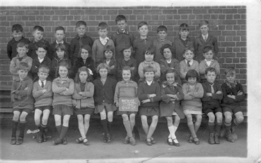 Image of Class 2A circa 1928. Rosa Harrison is 3rd from right on middle row. [courtesy of Garry Buckell (Rosa's son)]