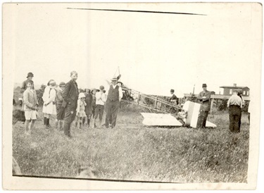 image of an Early plane lands in a Reservoir paddock