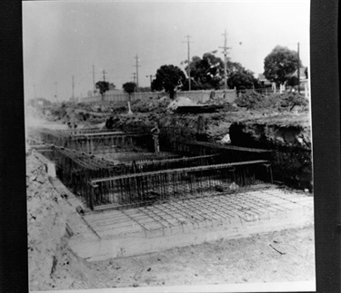 Image of Road works in Grange Road. Construction of railway line to the paper mills. [LHRN1886-2]