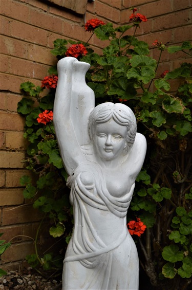 White Statue of woman in Margaret's garden
