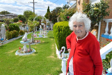 Margaret Simmons at her front garden